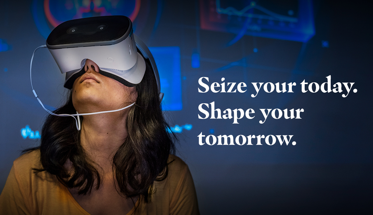 Seize your today. Shape your tomorrow. Student uses VR headset in class