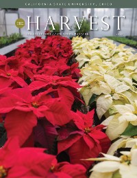 Magazine cover featuring red and white poinsettias