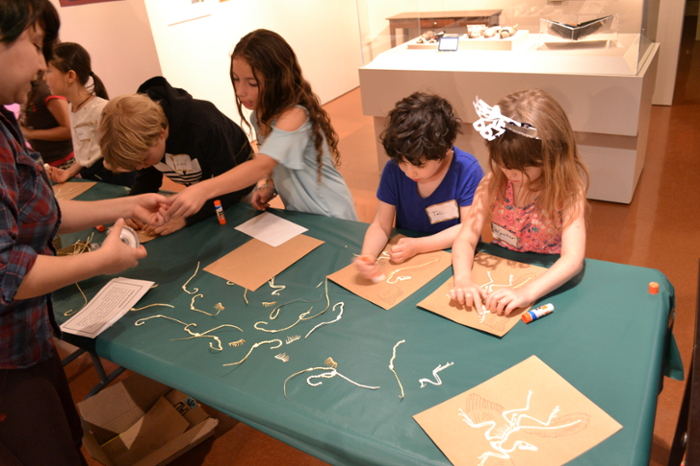 kids working on an activity at a table