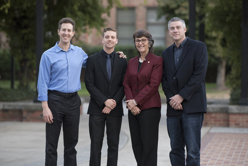Professor Josh Trout, award recipient Daniel Human, President Gayle E. Hutchinson, and Department Chair of Kinesiology, Kevin Patton.