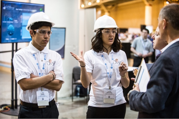 CSU, Chico students Jorge Alvarado and Angelina Teel-Jonson discuss their concept at the Collegiate Wind Competition 2016.