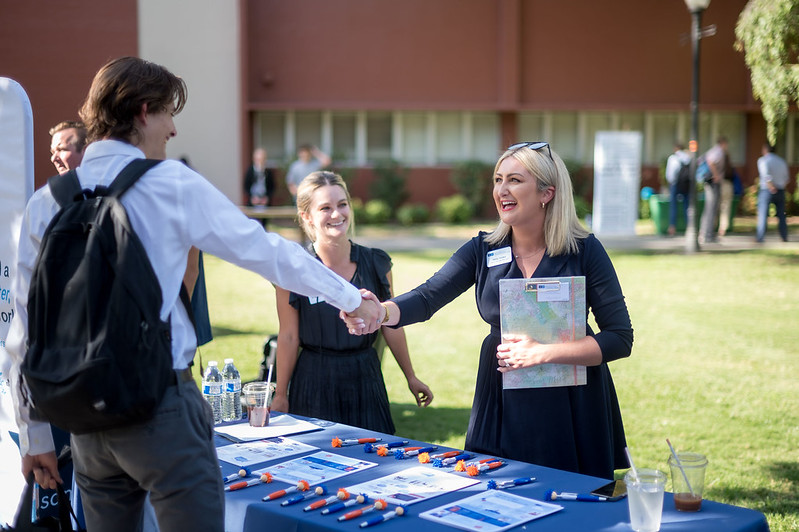 Students at a business fair