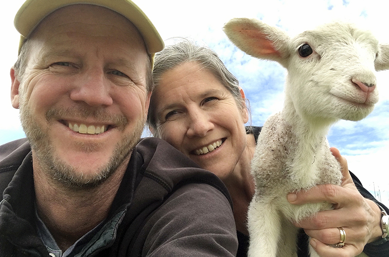 Greg Massa and Raquel Krach and a lamb