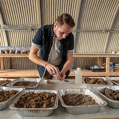 Student Seth Myrick processes soil samples in the SPA