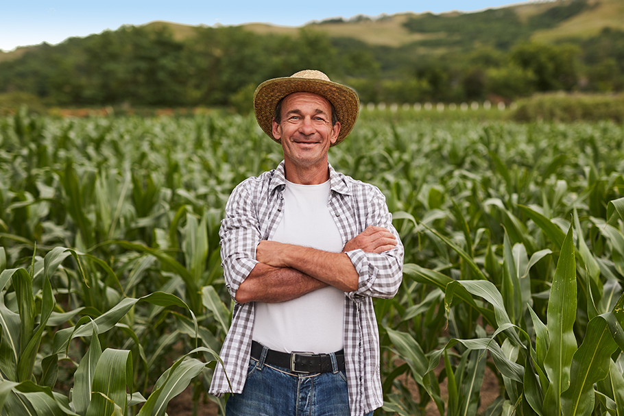 farmer in a field using a tablet