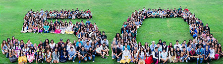 Upward Bound students and alumni in large group shaped as the number 50