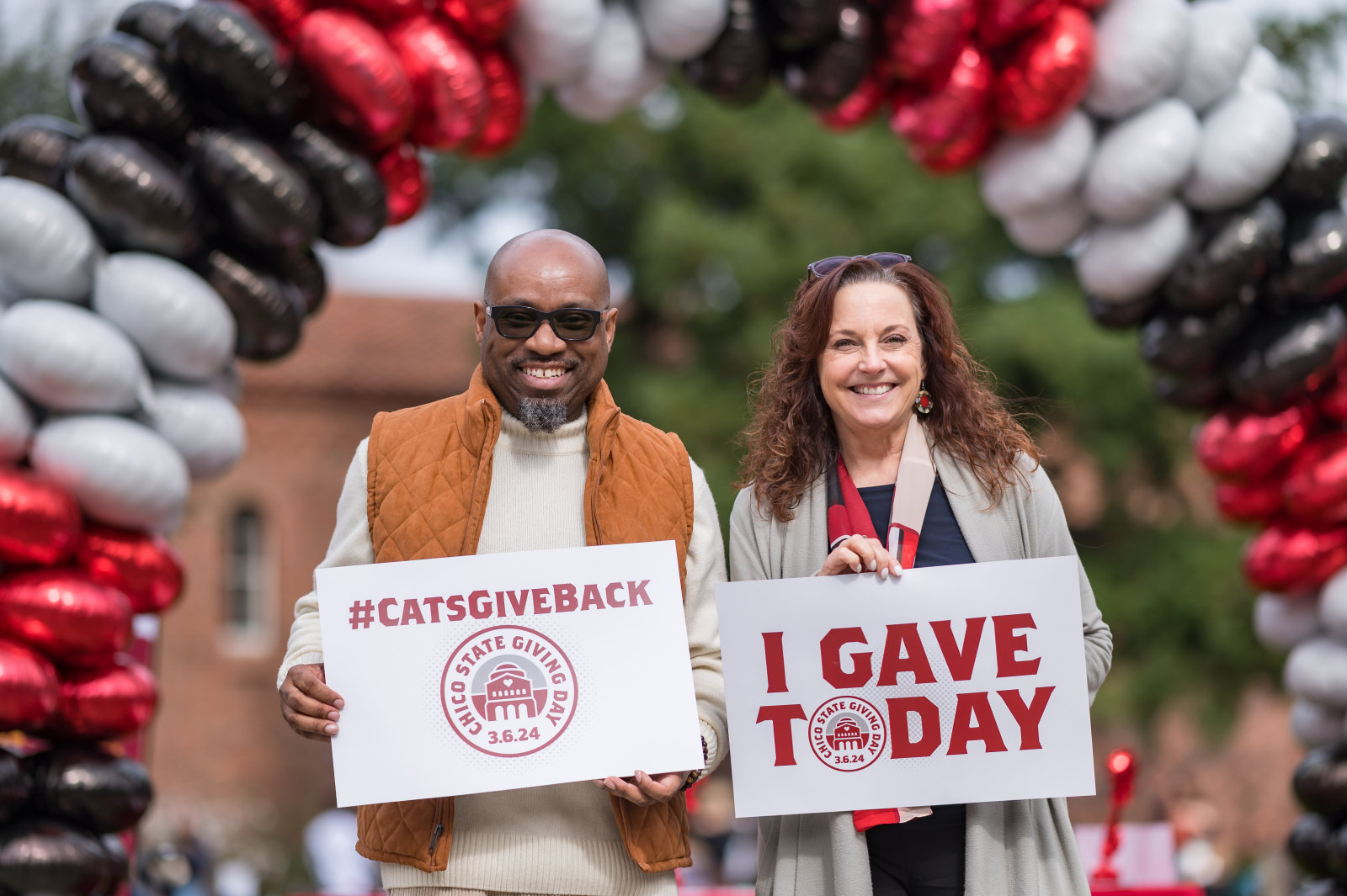 Provost Leslie Cornick and Vice President of Student Affairs Isaac Brundage participate in Giving Day