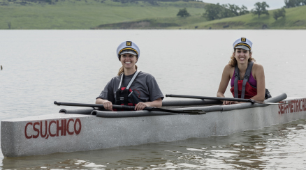 Students Pose in their custom Concrete Canoe 