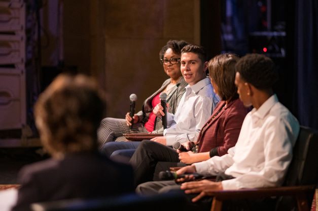 Students answering questions at a campus panel