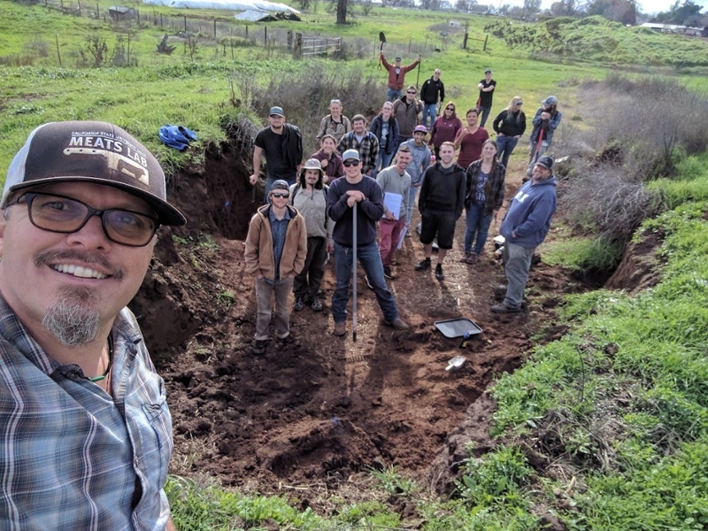 “Soils are fun and everyone should learn more,” is the message that Dr. Garrett Liles imparts to his students, pictured here exploring soils at the university farm.