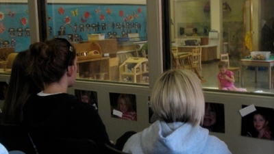 students observing children