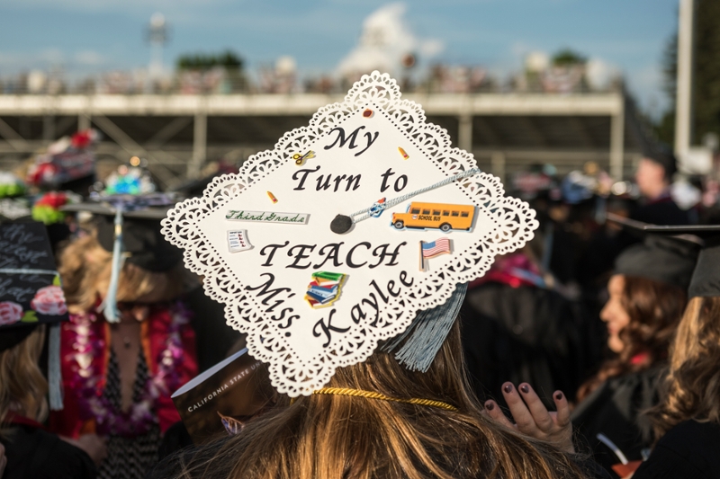 Cap that reads, "My turn to teach."