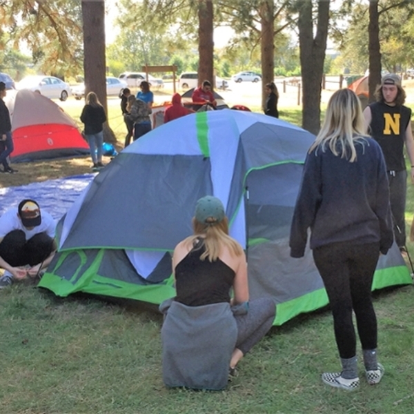 students learn to set up tent