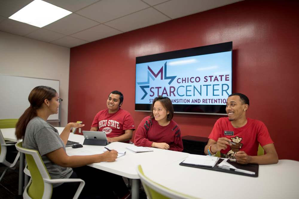 Students talk with an advisor in the STAR Center