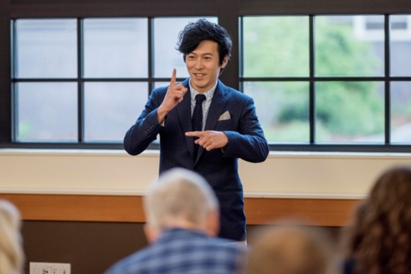 Koichi Matsumoto pitches Golden Milestone Co. as competitors are challenged to present their best business concepts to a multitude of guest judges for a chance to win prizes during the Center for Entrepreneurship Pitch Party event on Wednesday, April 12, 2017 in Chico, Calif. (Jason Halley/University Photographer)