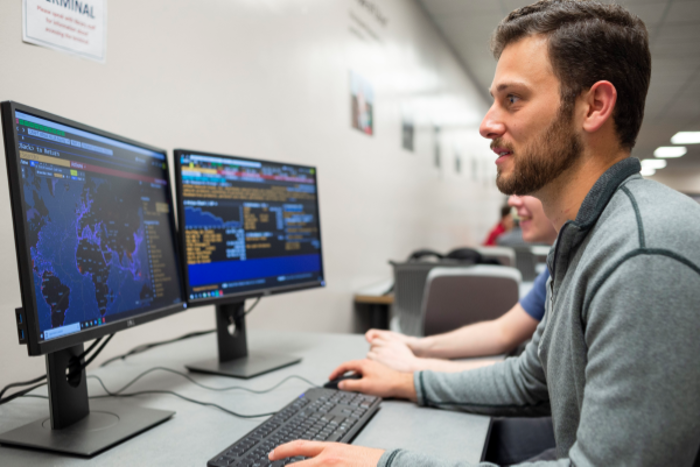 Students work at the temporary Bloomberg Terminal in the Meriam Library. 