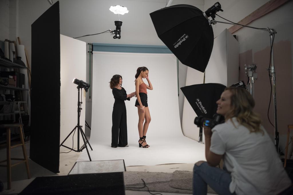 Debra Cannon assists a Lulus model during a photoshoot.