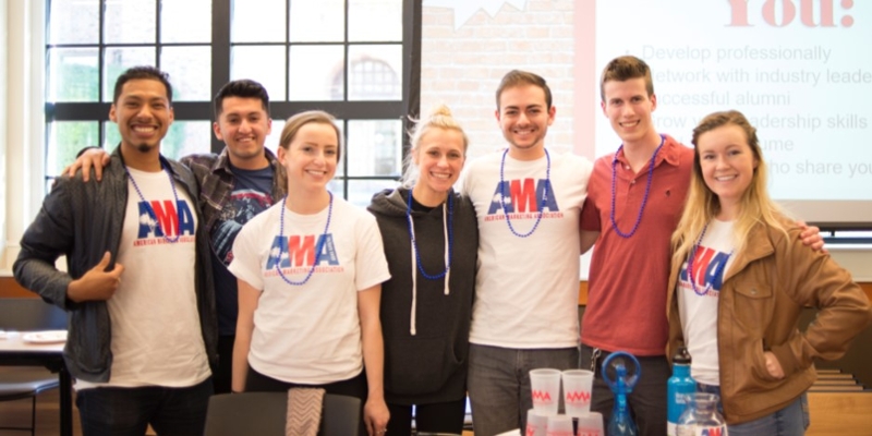 Students from the American Marketing Association club posing for a photo.