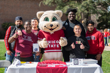 Chico State students with Willie the Wildcat.
