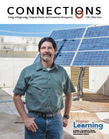 ECC Connections cover shows person standing in front of solar panel