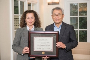 2017 Distinguished Alumna Rose McCallen receives award from Interim Associate Dean Dick Hsu