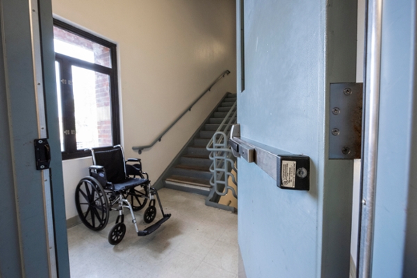 A wheelchair in a stairwell
