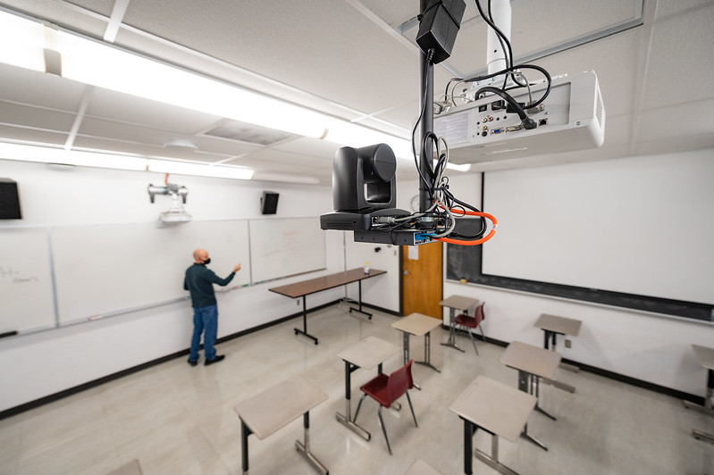 Projector and Camera mounted within a classroom facing the teacher