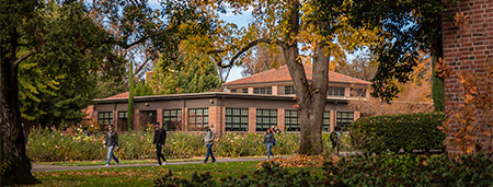 Students walking by Colusa Hall in the Fall.