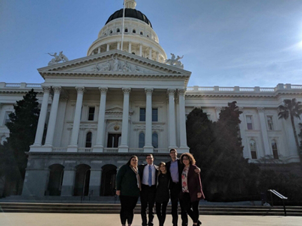 Students standing outside of the Capital Building in Sacramento, CA
