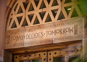 Today Decides Tomorrow, written above the entrance of Kendall Hall