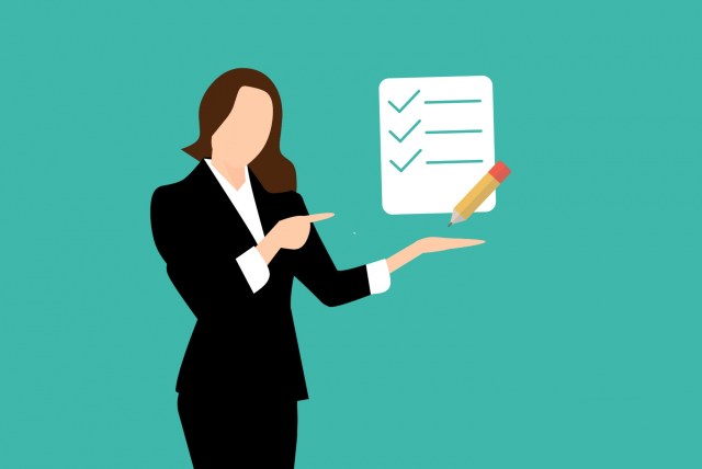 Woman pointing to checklist