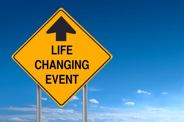 Sign with words Life Changing Event and arrow pointing up