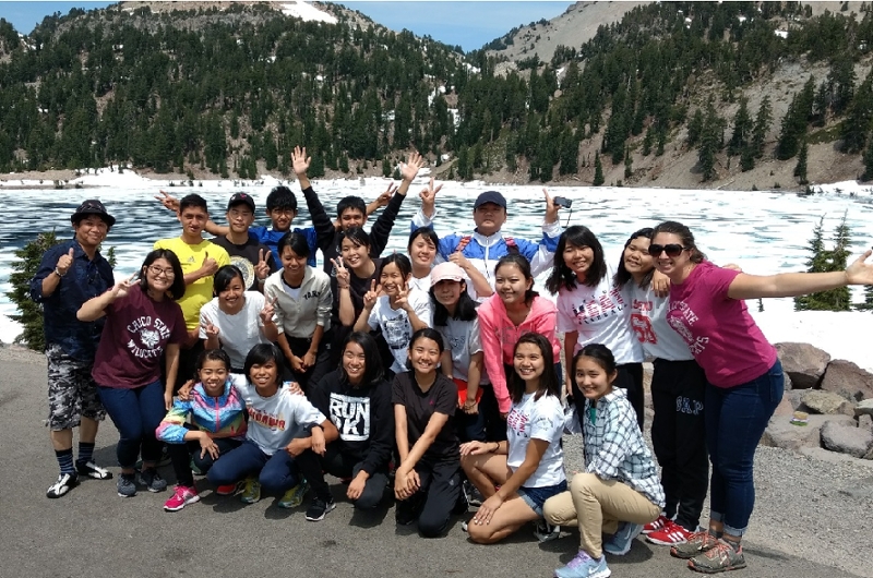 Okinawa high school students at snowy lake in Mount Lassen National Park