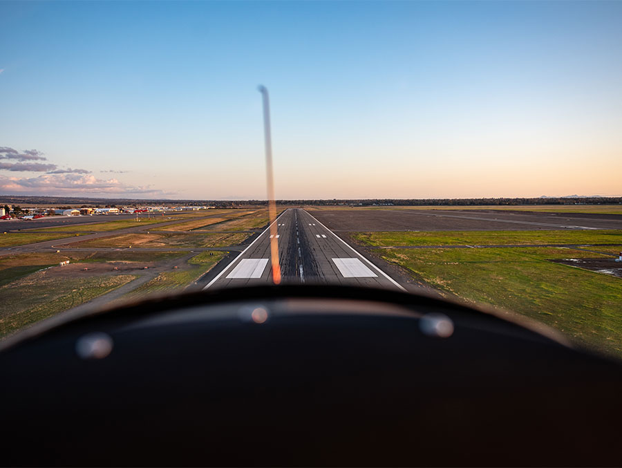 Cockpit view of a plane appraching a runway for landing
