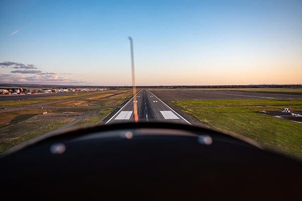 Cockpit view of a plane appraching a runway for landing