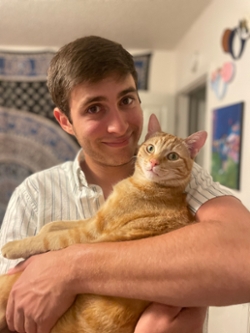 Asher Armstrong Fall 2023 Tutor with his cat
