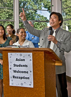 Asian American Studies Welcome reception gathering with a professor and students