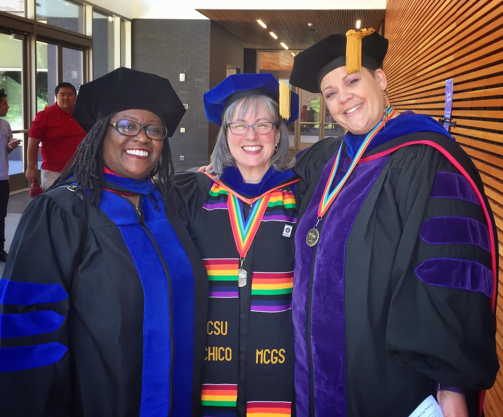 three professors in the graduate ceremony 