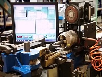 C-N-C addition to mandrel tube bender with computer monitor in the background