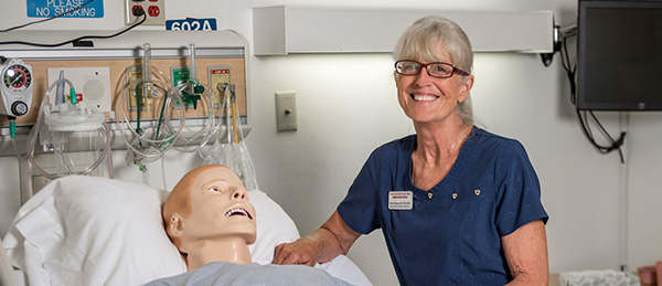 instructor with patient simulator