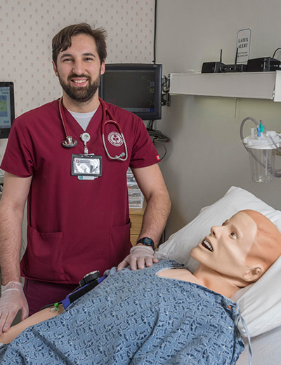 student with patient simulator