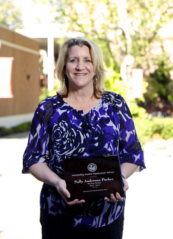 Professor Sally Anderson was awarded the Myles Tracy Outstanding Student Organization Advisor Award for her work with the Pre-Law Society in April 2013.
