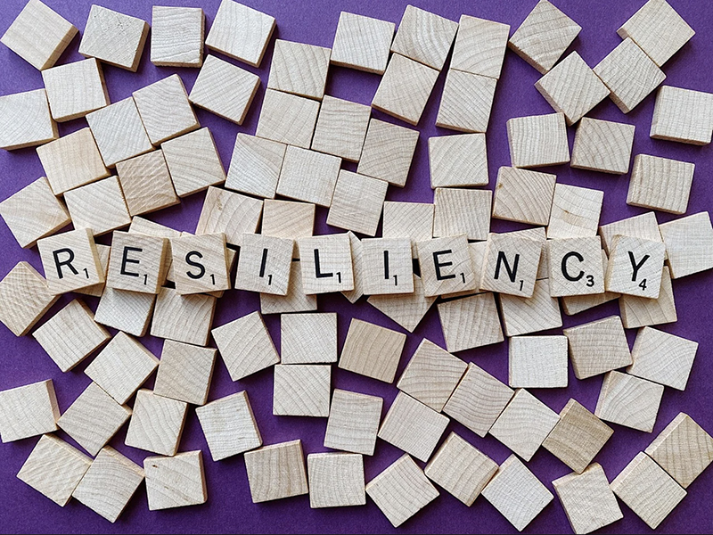 scrabble pieces spelling out the word "resiliency"
