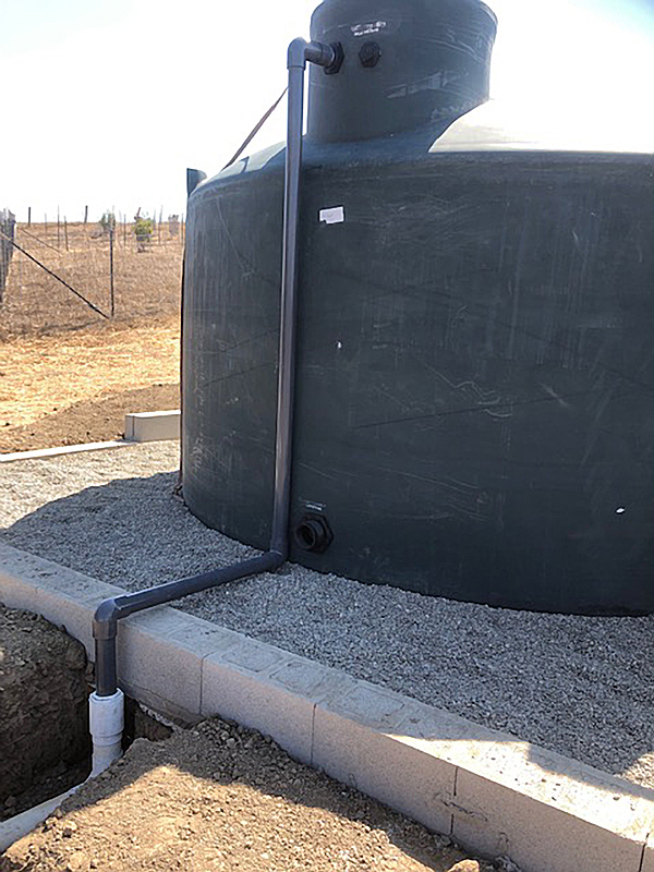 Installed plumbed tank