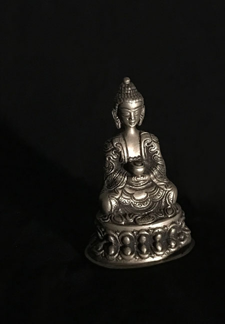 statuette of buddha