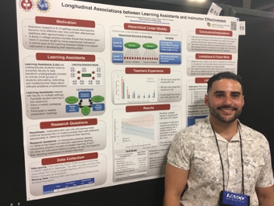 Daniel Caravez and his summer research poster