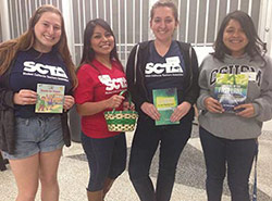 scta students with education materials