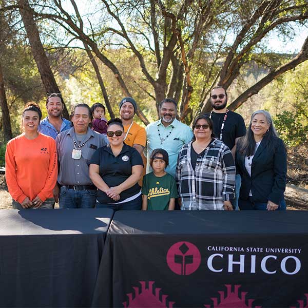 Mechoopda Indian Tribe of Chico Rancheria chairman Dennis Ramirez and Provost Debra Larson (VPAA) sign an agreement