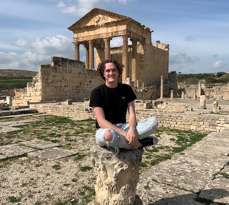 Wes in front of ancient ruins