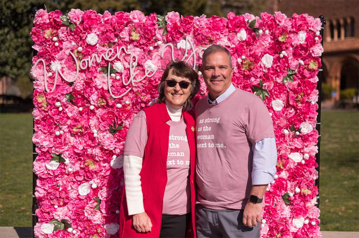 President Hutchinson and Interim Provost Perez pose for Pink Shirt Day
